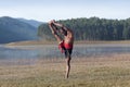 Indian man doing yoga exercise outdoors in Kerala, India Royalty Free Stock Photo