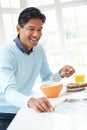 Indian Man Enjoying Breakfast At Home Royalty Free Stock Photo