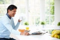 Indian Man Enjoying Breakfast At Home Royalty Free Stock Photo