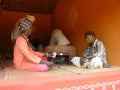 Indian man fortune-teller parrott statue