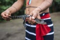 Indian man and his pet - cayman, Ecuador