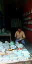 Indian man making marble stone art designing at store