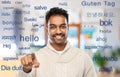 Indian man over words in foreign languages Royalty Free Stock Photo