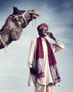 Indian Man Phone Camel Communication Technology Concept Royalty Free Stock Photo