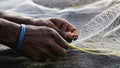 Indian man preparing the fishing net Royalty Free Stock Photo