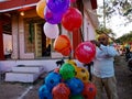 an indian man selling balloon at street in india January 2020 Royalty Free Stock Photo