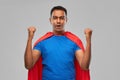 Indian man in superhero cape makes winning gesture Royalty Free Stock Photo