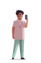 Indian man taking selfie photo on smartphone camera smiling male cartoon character standing pose full length isolated Royalty Free Stock Photo
