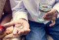 Indian man taking tablets medicine