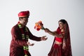 Indian man in turban catching bouquet Royalty Free Stock Photo