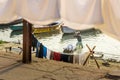 Indian man washing clothes in holy water of river Ganga in the morning. Varanasi. India Royalty Free Stock Photo