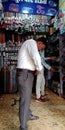 an indian man wearing belt in shop in india oct 2019