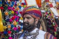 Indian man wearing traditional dress participate in mister desert contest of festival in Jaisalmer, Rajasthan, India Royalty Free Stock Photo