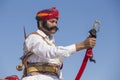 Indian man wearing traditional dress participate in mister desert contest of festival in Jaisalmer, Rajasthan, India Royalty Free Stock Photo