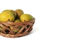 Three big mango fruit on basket, isolated on white. indian mangos in a basket on a white background Royalty Free Stock Photo