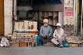 Indian market vendors selling snack in local street shop Royalty Free Stock Photo