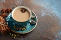 Indian masala chai tea. Spiced tea with milk on dark rusty background. Royalty Free Stock Photo