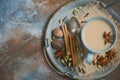 Indian masala chai tea. Spiced tea with milk on dark rusty background. Royalty Free Stock Photo