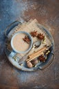 Indian masala chai tea. Spiced tea with milk on dark rusty background. Royalty Free Stock Photo