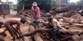 indian matured worker cutting wood logs at sawmill factory in India oct 2019 Royalty Free Stock Photo
