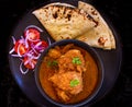 Indian meal- chicken curry and roti Indian flatbread