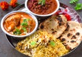 Indian non-vegetarian Meal -Butter Chicken, rajma, biryani with roti and salad