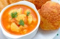 Indian meal-gravy dish served with fried flatbread