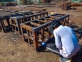 an indian mechanic doing welding work during railway iron bridge construction on site in India January 2020 Royalty Free Stock Photo