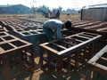 an indian mechanic making iron structure during indian railway bridge construction on site in India January 2020 Royalty Free Stock Photo