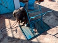 an indian mechanic repairing iron table at home in India January 2020