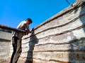 indian mechanics during repairing task at workshop in india dec 2019 Royalty Free Stock Photo