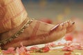 Indian Mehndi painting on the foot feet girls close up Royalty Free Stock Photo