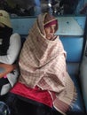 Indian middle class old lady on indian train . candid potrait unedited