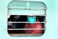 Indian migrant laborers sitting in the train ready to leave the city due to covid-19 pandemic.