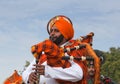 Indian military bagpipers band playing bagpipe during Camel festival in Rajasthan state, India