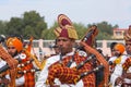 Indian military bagpipers band playing bagpipe during Camel festival in Rajasthan state, India