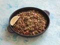 Indian minced meat Qeema on a blue table. Royalty Free Stock Photo