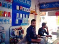 indian mobile shopkeeper standing inside the vivo mobile store in India dec 2019 Royalty Free Stock Photo