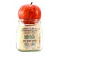 Indian money in glass jar with red juicy apple on top of jar, concept of getting dividends or returns from your money Royalty Free Stock Photo