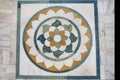 Indian mosaic on the floor made of stone Royalty Free Stock Photo