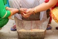 Indian Mother Complete a Rasam in Wedding Ritual