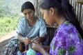 Indian mother and daughter sitting crocheting Royalty Free Stock Photo