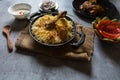 Indian mughlai delicacy chicken biryani in a cooking pan ready to be served . Royalty Free Stock Photo