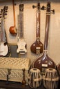 Indian musical instruments stringed guitars called sitars and Indian Folk percussion barrel shaped bass drums