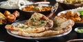 Indian naan bread with herbs and garlic seasoning on plate Royalty Free Stock Photo