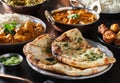 Indian naan bread with herbs and garlic seasoning on plate Royalty Free Stock Photo