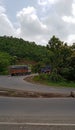 Indian National Highway Road with Trees around and Heavy Vehicles