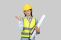 Female Asian Construction Engineer with chartboard and notebook gives expressions, gestures