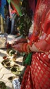 An Indian and Nepali traditional wedding: henna paints on hands of a bride