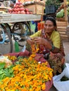 Indian Old Lady Sells Flower Royalty Free Stock Photo